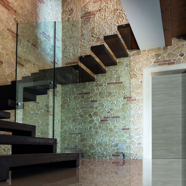 Plam Stone, stamped wall with brick, giallo tufo and brown finish, mould Pietra Vecchia + Montana. Private villa, Maser (Italy)